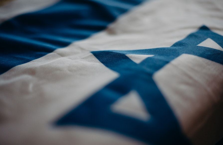 Close-up of blue and white Israeli flag
